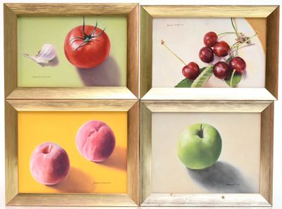 paintings of fruit and vegetables are displayed in a wooden frame