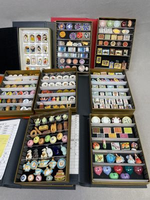 many different types of buttons in a display case