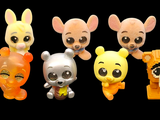 five little animals that are posed together in a row