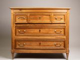 a wooden chest of drawers with four drawers on each side