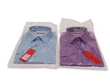 two men ' s shirts in plastic bags on a white background