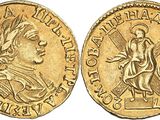 l'image d'une pièce d'or sur laquelle figure une femme
