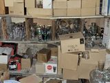 a room filled with lots of boxes and boxes on shelves