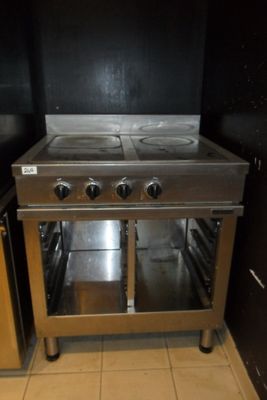 a stainless steel stove with two burners in a kitchen