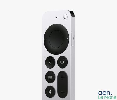 a white remote control that is sitting on a table