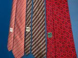 three ties hanging on a wall with a blue background