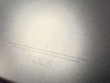 a close up picture of a laptop computer with the word cache written on it