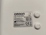 a close up of a white toilet with buttons on it