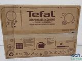 a cardboard box with a picture of a cooking utensil on it