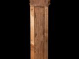 an image of a wooden column with a clock on top of it