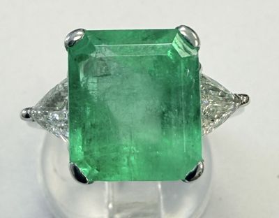 an emerald and diamond ring