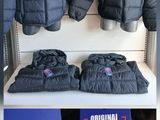 several pictures of jackets and jackets on display in a store