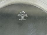 an image of a close up view of a silver plate