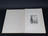 an open book with a black and white drawing on it