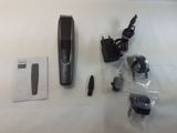 an image of a hair clipper and other items on a table