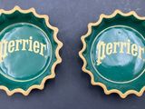 pair of green and gold tarrings with the word tarringer written on them