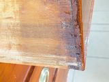 a close up of a piece of wood on a dresser