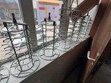 a window that has a bunch of chairs in it