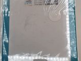 a close up of a plastic bag with a white label on it