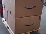 two boxes stacked on top of each other on a pallet