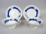pair of blue and white porcelain dishes with gold trim