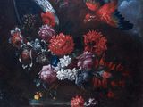 painting of flowers and birds in a vase on a table
