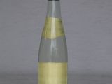 a bottle of wine that is sitting on a table