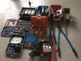 a lot of tools that are sitting on the floor
