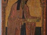 an old painting of a man holding a scroll in his hand