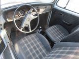 a car that has a steering wheel and a dash board