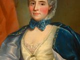portrait of a woman in a blue and white dress and a blue shawl