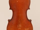 an old violin with a wooden back and bow on a white background