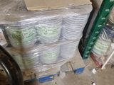 a stack of cups sitting on top of a carton