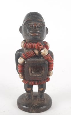 a close up of a figurine of a man holding a box