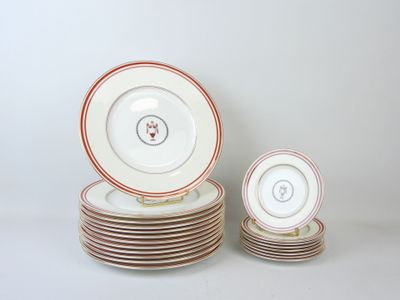 many plates stacked on top of each other on a table