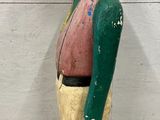 a statue of a man with a hat on his head
