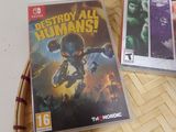 two video games sitting on a table next to each other