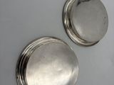 pair of silver plated coasters