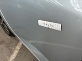 a close up of a car with a sticker on it ' s hood