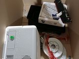 a box with a computer and other items inside of it