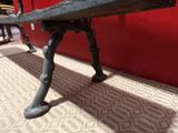 a metal bench that is sitting on the floor