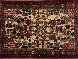 a close up of a rug on a wooden floor