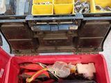 a red tool box filled with assorted tools