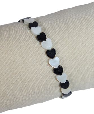 BRACELET "Cœurs" en nacre et grès bleu, longueur : 15 cm.