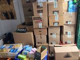 many boxes of food and drinks in the garage