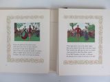 an open book with a picture of a man and a woman dancing
