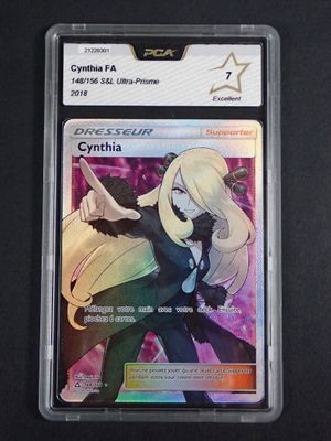 a close up of a card in a plastic case on a table