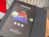 a book that is sitting on top of a shopping cart