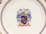 a plate with a coat of arms on it