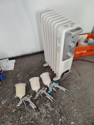 a radiator that is sitting next to a bunch of tools